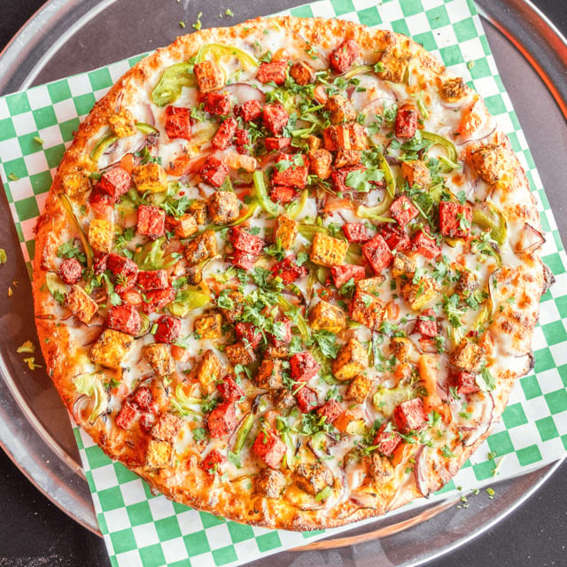 Vegetarian Butter Paneer Pizza.